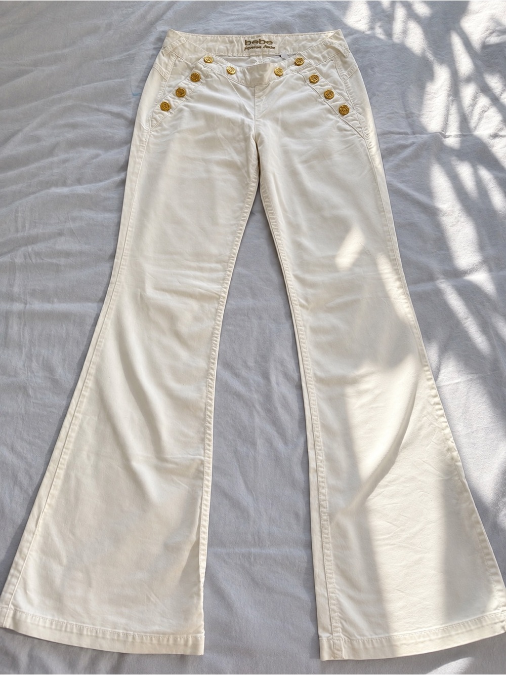 bebe Cream Flared Jeans with Gold Button Detail